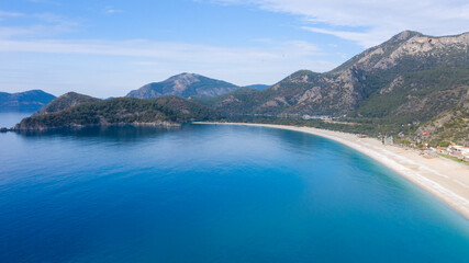 Obraz na płótnie Canvas A fascinating view that has the unique nature of Oludeniz which is a county of Fethiye in Turkey. Because of its warm climate and fresh air, it has been an important destination to visit for tourists.