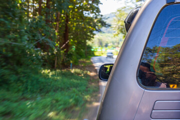 Blurry abstract image photo of fast car with another car warning for danger.