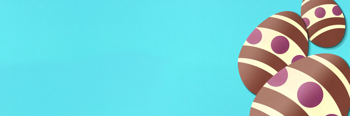 Easter eggs on light blue background. Colorful banner. Paper texture. Illustration.