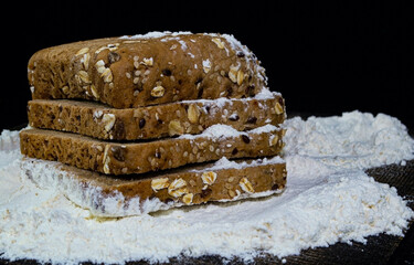 Wholegrain bread sprinkled with flour.