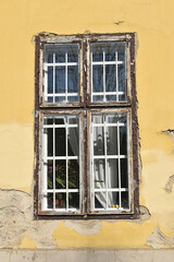 Fototapeta na wymiar Window of the old city hall building