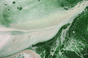 Acrylic Fluid Art. Natural green colors flow on canvas. Digital decor. Abstract stone background or texture