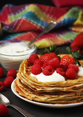 Russian cuisine national dish bliny with fresh berries