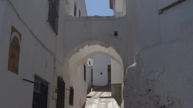 Moorish street with ancients archs in Comares, Axarquia, Spain