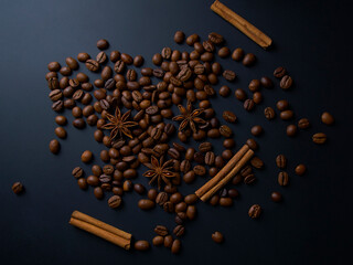 Roasted arabica coffee beans, cinnamon sticks and anise stars on a dark wooden background,top view
