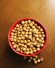 Roasted chickpea in a bowl, top view, leblebi snack food
