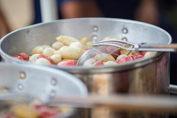 Thai food, meatballs with sauce on white place, close up

