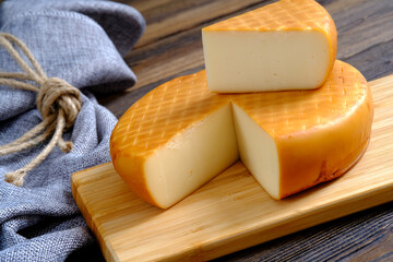 Abstract banner with a cheese head, with a cut-out piece for conceptual design. The concept of nutrition.