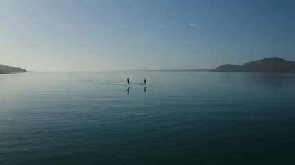 Drone Shot from a Rider wing foiling on the beautiful lagoon in south africa - Powered by Adobe