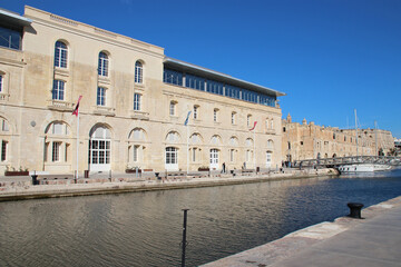Fototapeta na wymiar ancient stone building and quay in bormla in malta 