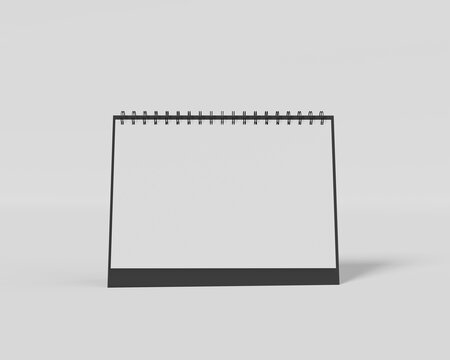 Realistic empty page spiral desk calendar on white background