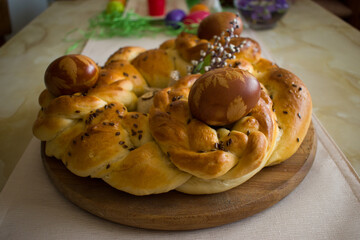 Handmade braided bread with Easter eggs