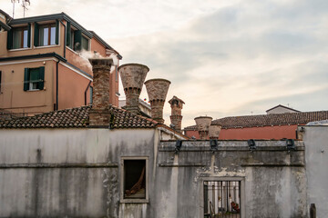 View of particular chimneys in the city of Chioggia, Veneto - Italy
