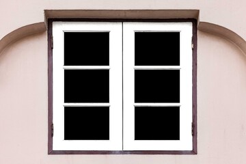 Two white wooden window frames isolated on a black background