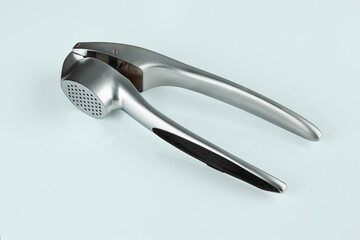 Obraz premium metal garlic press