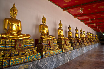 Golden Buddha statues at Wat Pho temple, Bangkok (Thailand)