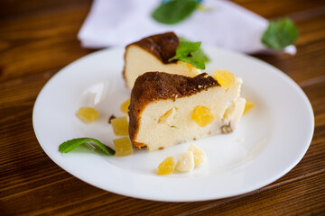 sweet baked cottage cheese casserole with nuts and candied fruits