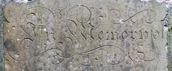 Gravestone letter Carving for texture background In Memory of Text