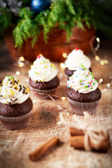 Chocolate muffins and cinnamon cake on the New Year table