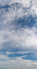 Fantastic soft clouds against blue sky, panorama