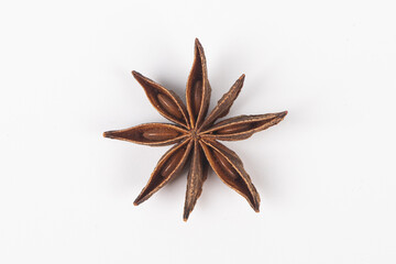 Star anise spice fruits and seeds isolated on white background closeup