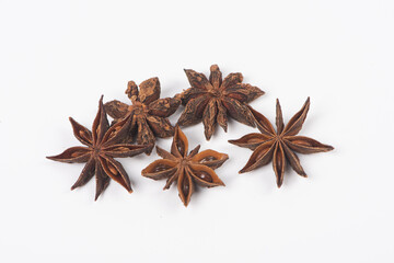 Star anise spice fruits and seeds isolated on white background closeup