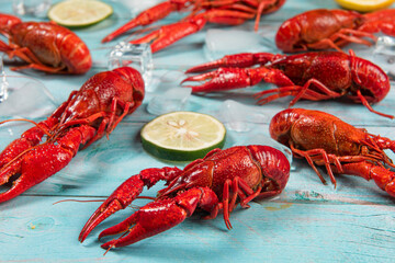 Boiled red crawfish or crayfish on wooden background