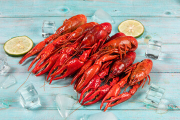 Boiled red crawfish or crayfish in plate on table