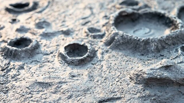 angle pan view ground with craters