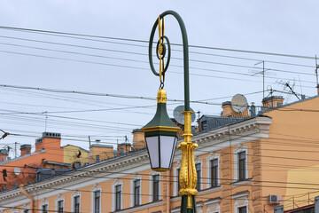 Street lights on the Green Bridge over the Moika River on Nevsky Prospekt. Beautiful decorative...