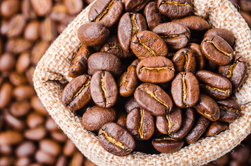 Top view of coffee beans in sack bag.