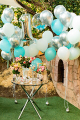 Birthday luxury outdoor decoration. One years old child birthday decoration with balloons and other ornaments