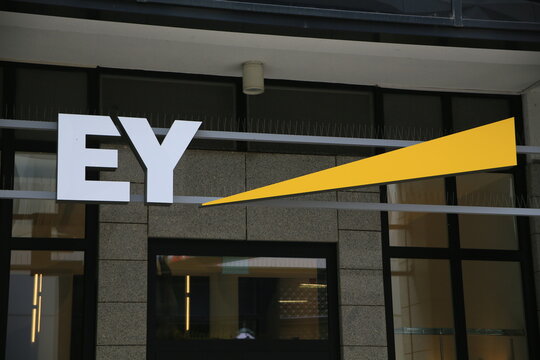 Leipzig, Germany - March 7. 2021: Closeup of Ernst and young logo lettering above entrance (focus on lettering left)