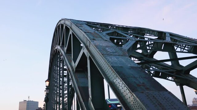 Newcastle upon Tyne UK: 16th March 2021: The Tyne Bridge close up, a static shot during blue hour, with rust visible ready to be painted