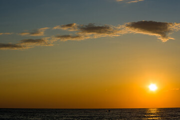 Amazing sea sunset, the sun, waves, clouds