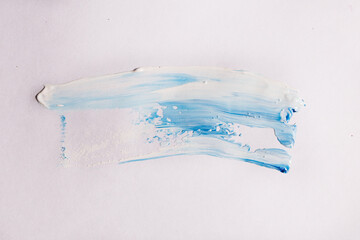 oil paint brush strokes on paper. blue and white