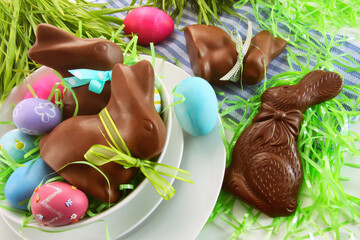 Assorted easter bunnies and eggs on kitchen counter - 421804434
