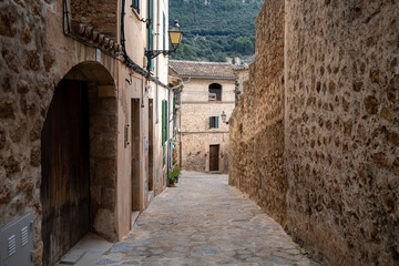 Beautiful streets with plants in the village of Valldemossa in the Sierra de Tramuntana. Palma de Mallorca, Spain