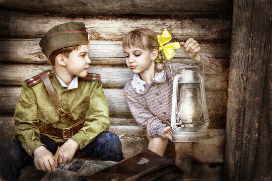Postcard, stylized as vintage for the Victory Day. A boy in a military uniform and a girl in an old dress. The theme of May 9, Victory Day in Russia. Soft selective focus, added noise.