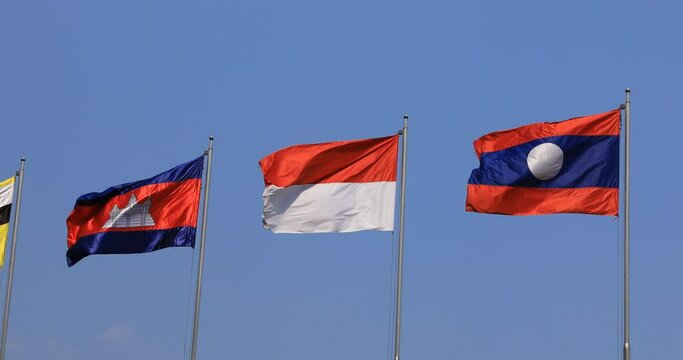 National Flags of ASEAN countries behind the sky in Ho Chi Minh panning