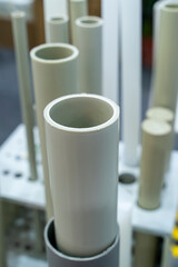 PVC pipes stick and stacked in warehouse