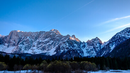 Fototapeta premium Sun goes down on Mangart, Italian alps