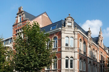 Fototapeta na wymiar Old historical red brick building in Leuven, Flemish Brabant, Belgium.