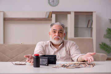 Old sick man suffering at home