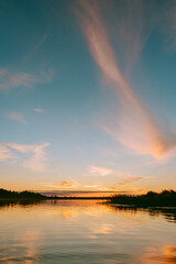 Sunset over the Lielupe river in Latvia during warm summer evening