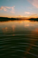Sunset over the Lielupe river in Latvia during warm summer evening