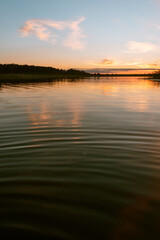Sunset over the Lielupe river in Latvia during warm summer evening