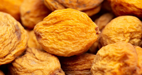 Dried apricots as an abstract background.