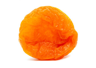 One dried apricot isolated on a white