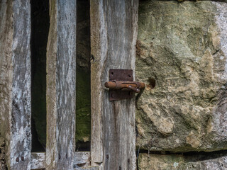 rusty latch on an old door